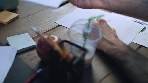 Businessman Hand Signing Cooperation Agreement at Negotiation Table. Close Up Hand Woman