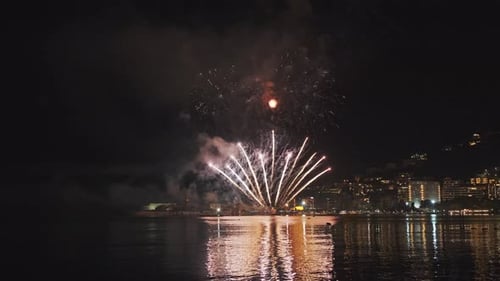 Fireworks with Colorful Lights Over Sea