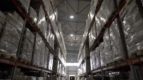 Huge Factory Warehouse with Large Boxes of Finished Products