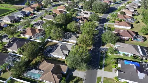 Luxury villas with garden and transparent conservatory in Florida.Sunny day in summer season. Plant