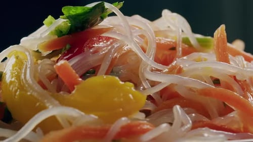 Glass Noodles Salad with Meat and Carrots Fermented Close Up Asian Chinese Traditional Food