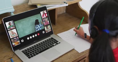 Student Learns Online with a Laptop at Home