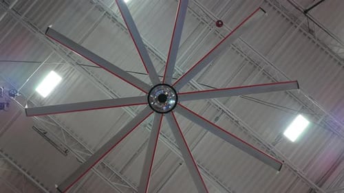 Industrial Ceiling Fan Inside of a Large Indoor Facility Warehouse