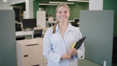 A Group of Thriving Young Professionals Working Together in a Corporate Office Setting