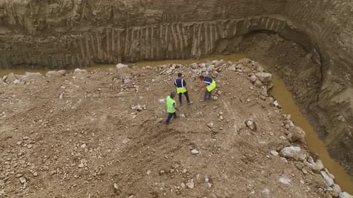 Constructive Collaboration Aerial of Construction Workers and Machines