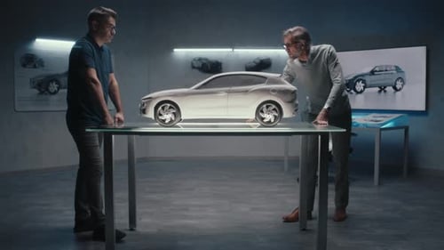 Automotive Designers Analyzing Car Design Model
