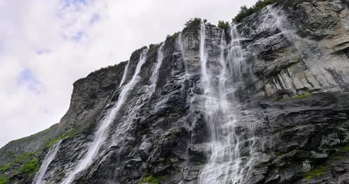 Geiranger fjord, waterfall Seven Sisters. Beautiful Nature Norway natural landscape.