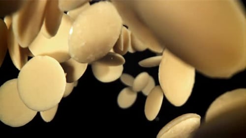 Abstract Round Discs Falling on Black Background