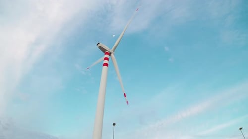 Wind Turbine Under Blue Sky