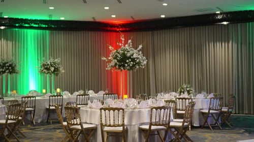 Beautifully Decorated Ballroom Tables Ready for a Wedding