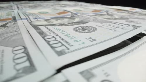 Pile of american dollars cash money put in a row, inflation concept. Closeup new american one hundre