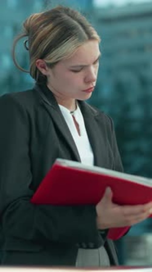 Business Tycoon Reviewing Red File Outside Glass Office Building Urban Scene
