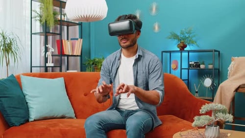 Young Adult Using Virtual Reality Headset at Home
