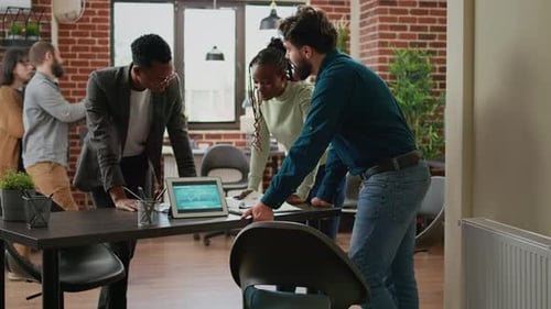 Diverse Group of Coworkers Planning Research Analysis in Business Office