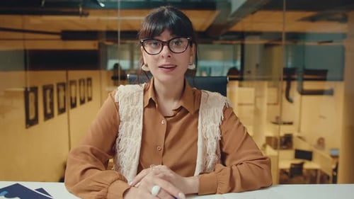 Woman Speaking in Modern Office Environment