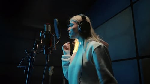 Modern Sound Studio for Recording Music Portrait of Singing Woman Singer Record of Soundtrack