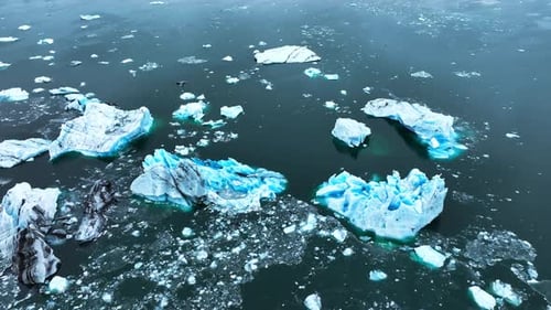 Cinematic Drone View of the Sharp Ice Ridges of Glacier Blue Ice Natural Landscape of the Icelandic