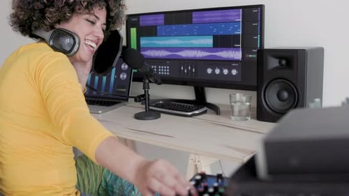 Music production, Artist record audio song in software with laptop in studio