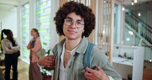 Education, student and man in college, face and smile for learning, scholarship