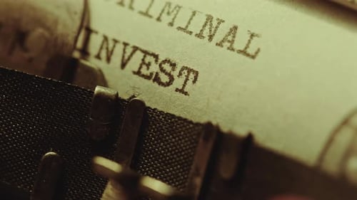 Typing Criminal Investigation Report on Vintage Typewriter