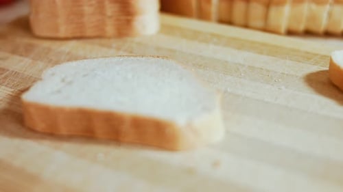 Fresh Slice of White Bread on Cutting Board