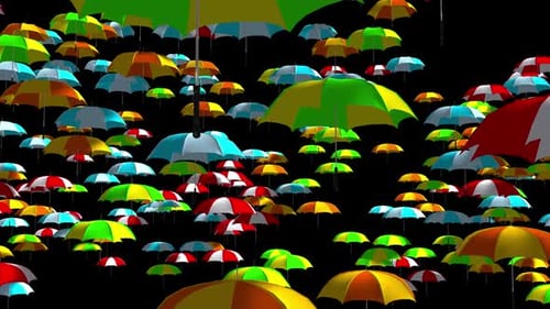 Colorful umbrellas floating in the dark