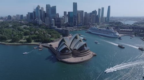 Vídeo aéreo da cidade de Sydney e do porto de Sydney ao pôr do sol, Austrália