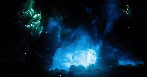 Mysterious Glowing Cave Illuminated By Vibrant Blue and Green Light Formations