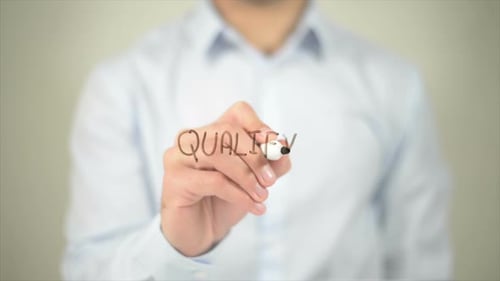 Qualify Man Writing on Transparent Screen