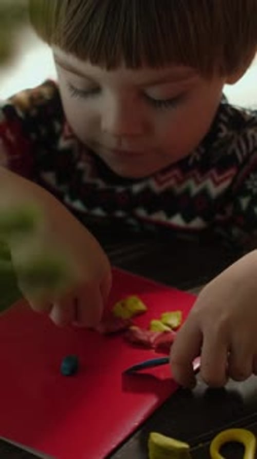 Vertical Video Small Boy Creating Christmas Greeting Card at Home