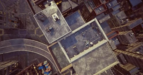 View of Urban Rooftops and Winding Streets in City Center During Daylight Hours