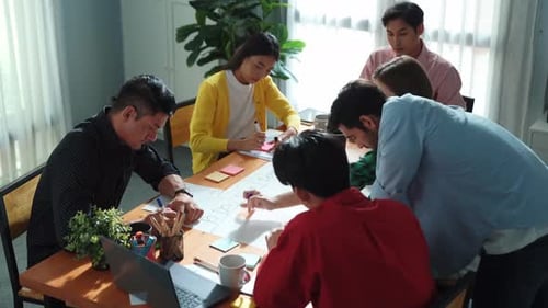 Team of people collaborating at the office