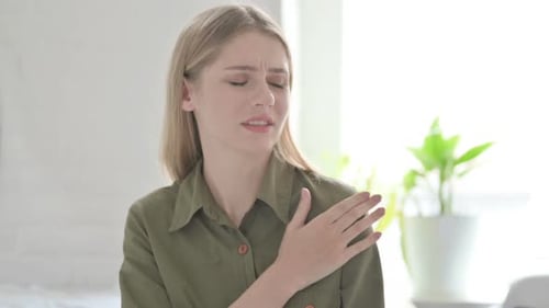 Tired Blonde Woman with Shoulder Pain, Workload