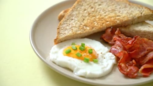 Breakfast Plate with Toast, Bacon, and Fried Egg
