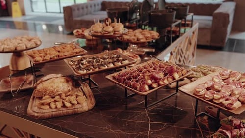Wedding buffet table with assorted appetizers and finger food