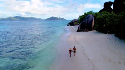 Discover Romantic Strolls Along the Pristine Beaches of Seychelles at Sunset
