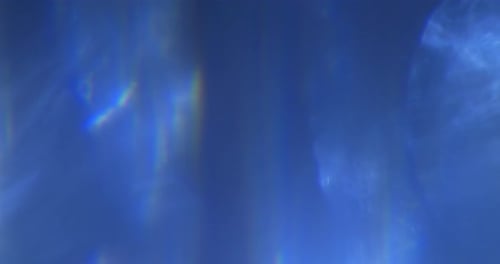 Abstract Light Leak Overlay with Dynamic Lens Flare Effect