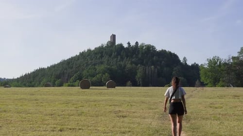Woman Walking Towards Waldeck Castle in Northern Vosges