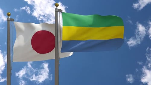Japan Flag Vs Gabon Flag On Flagpole