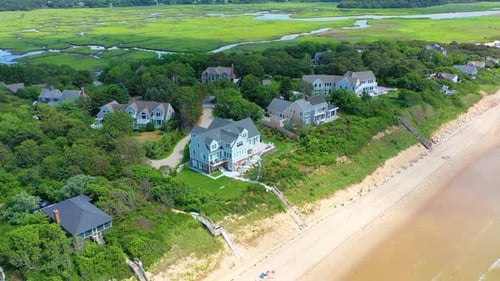 Coastal Homes and Beachfront on a Summer Day