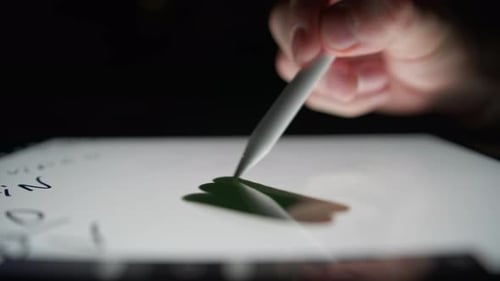 Stylus Drawing on Tablet in Close Up Shot