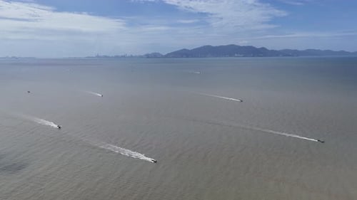 Aerial drone view of fisherman boats at sea near Pennag