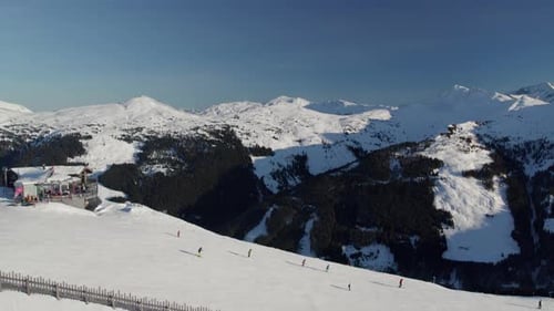 Skiers Over Downhill View From The Mountain Cable Car In Zwölfer-Nordbahn, Hinterglemm, Austria. Aer