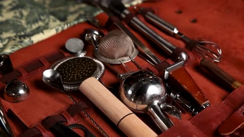 the bartender prepares a cocktail at the bar