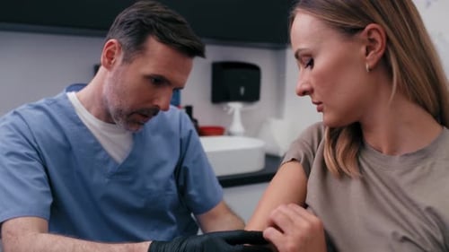 Medical Exam by Healthcare Professional with Patient