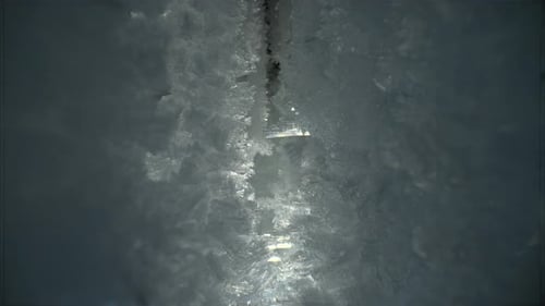 Beautiful Crystal Icicles Sharp Ice Snowflakes on Stalactites Inside Cave