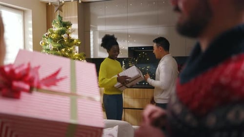 Friends Exchange Festive Gifts in Modern Home