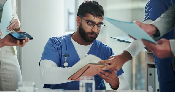 Doctor Multitasking with Tablet and Phone in Busy Clinic, Medical Stock ...