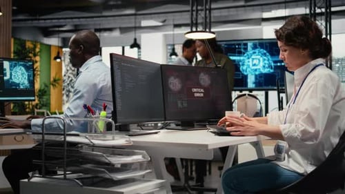 Office Workers Working on Computers at Their Desks