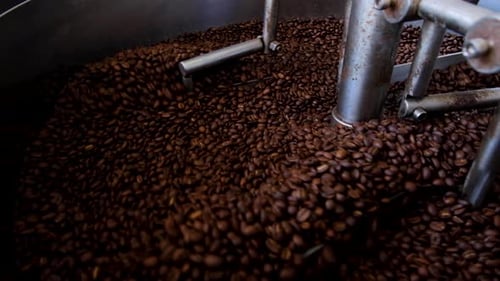 Coffee Beans Being Roasted in Roasting Machine